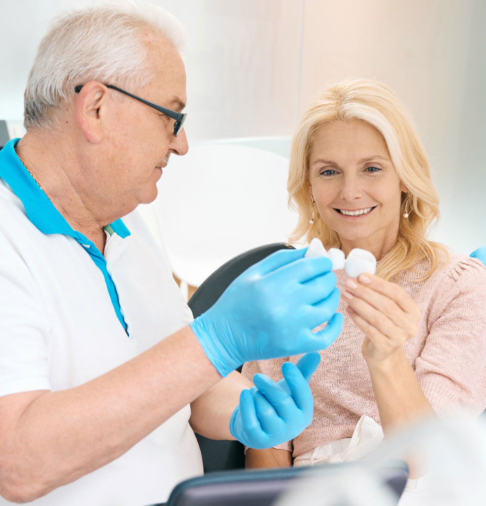 surgeon with potential implant patient